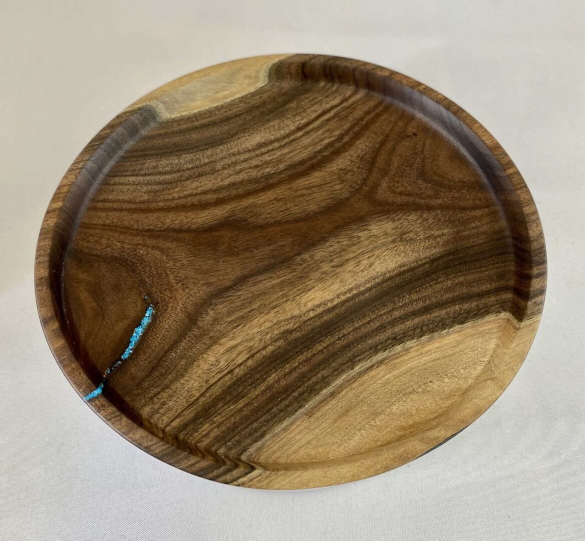 a wooden plate by AB Woodworking